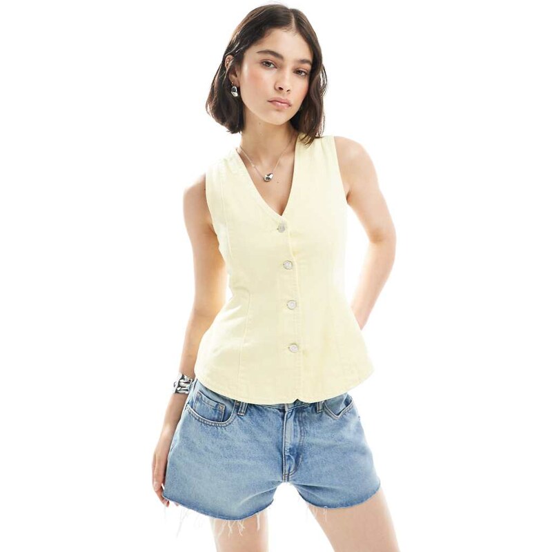 ASOS DESIGN denim peplum waistcoat in buttermilk-Yellow