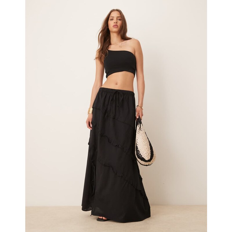 Esmee Exclusive maxi beach skirt with ruffle detail in black 107908405