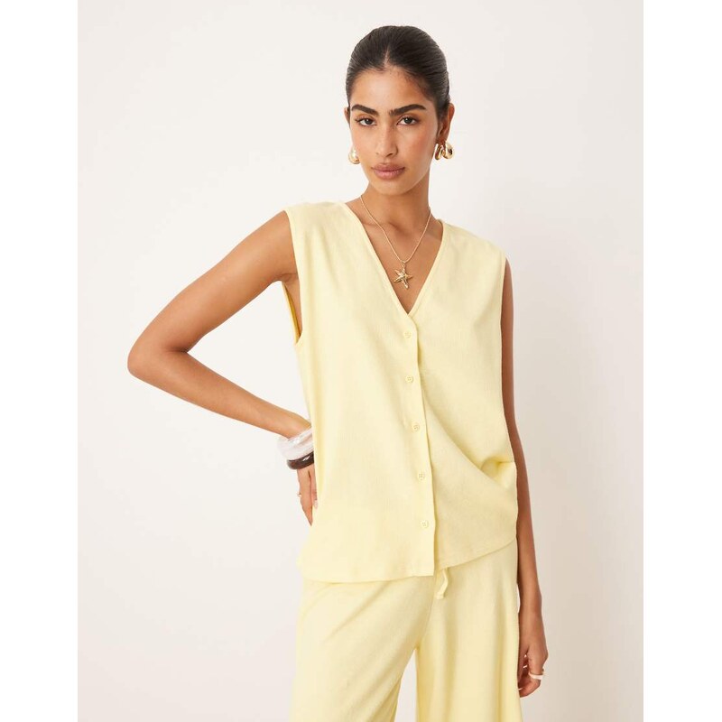 ASOS DESIGN textured knit oversized waistcoat in buttermilk
