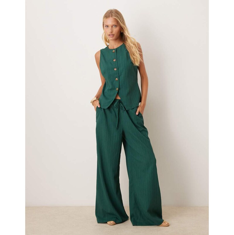 ASOS DESIGN crinkle palazzo trousers co-ord in bottle green 115513092