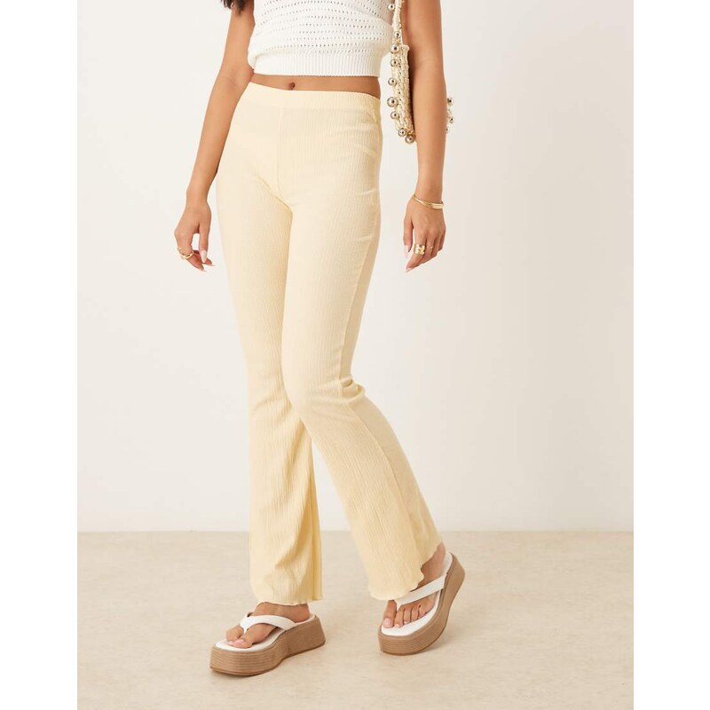 ASOS DESIGN crinkle flare trouser in buttermilk yellow