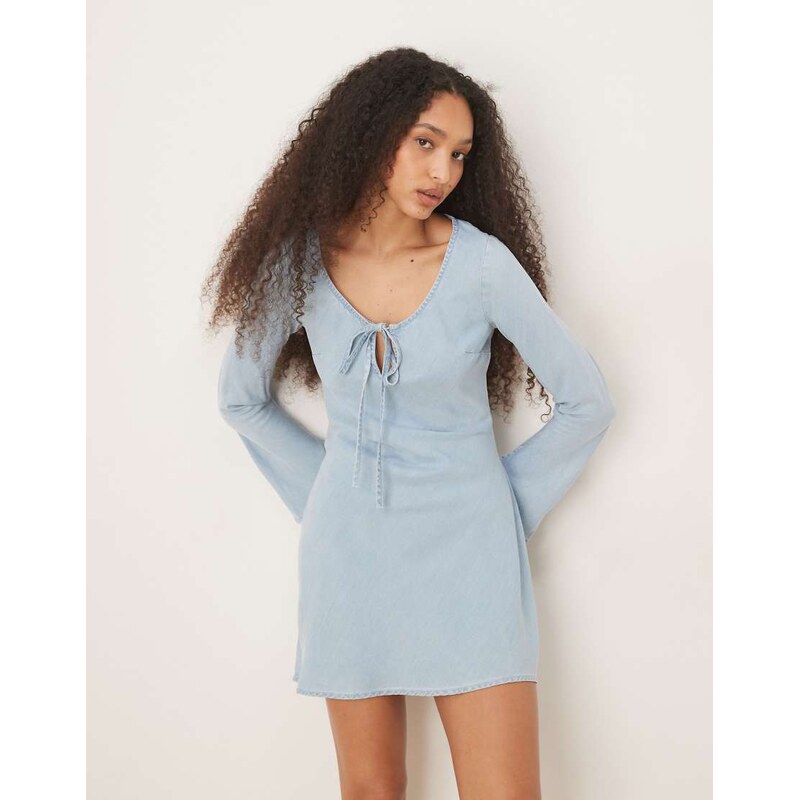 ASOS DESIGN soft denim mini dress with bow front detail in light