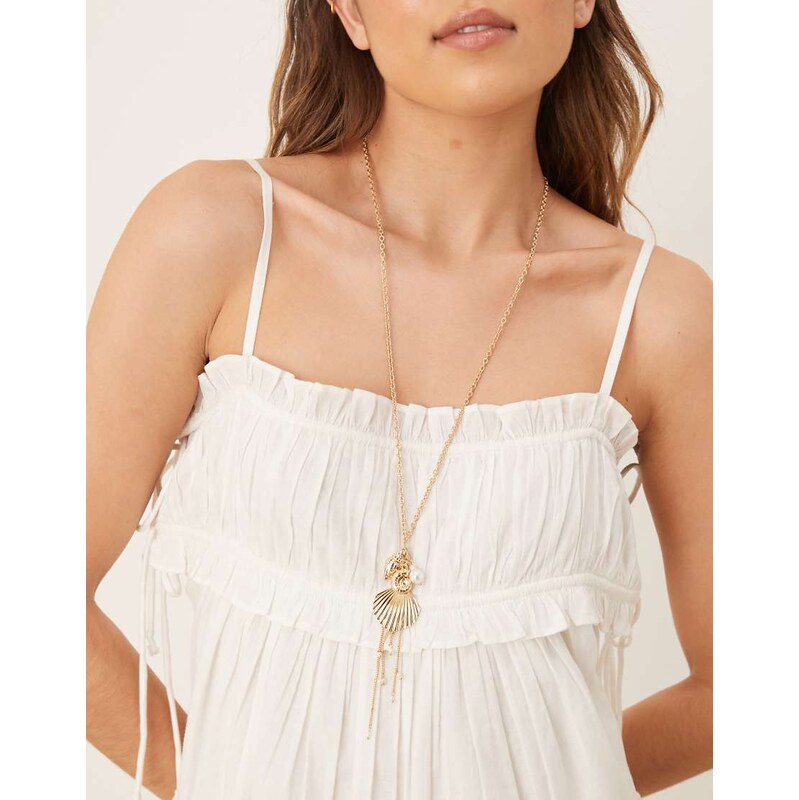 Accessorize ocean charm pendant necklace in gold 106917534