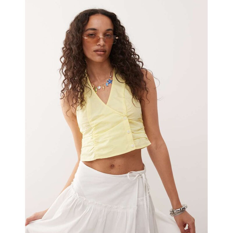 Monki halter neck wrap top with ruched sides in pale yellow 107014071