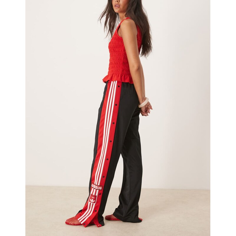 adidas Originals Adibreak track pants in black and red 107039055