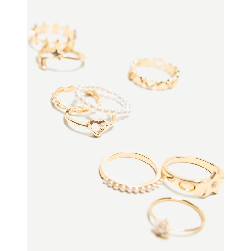 Bershka 9 pack of thin faux pearl rings in gold 107127772