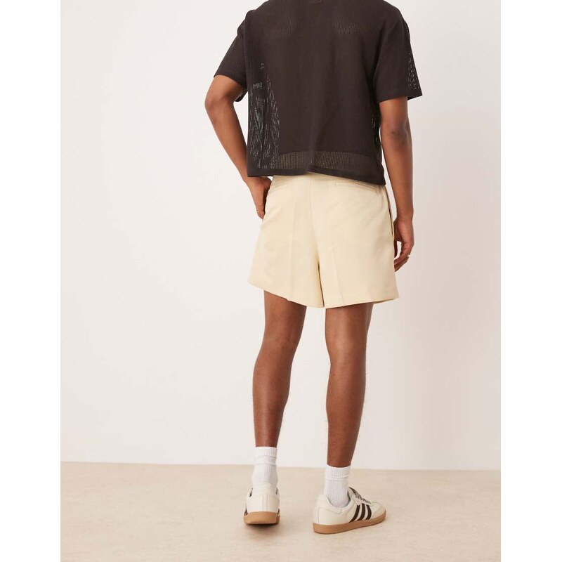 ASOS DESIGN smart bermuda cropped shorts with front pleat in buttermilk-Yellow