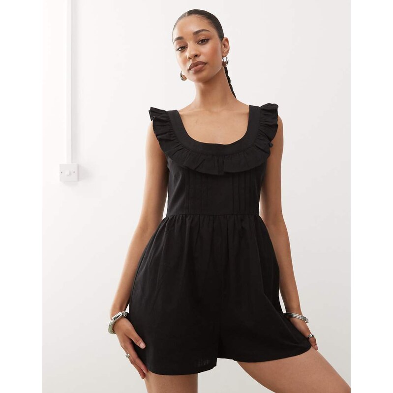 Reclaimed Vintage playsuit with frill neck in black