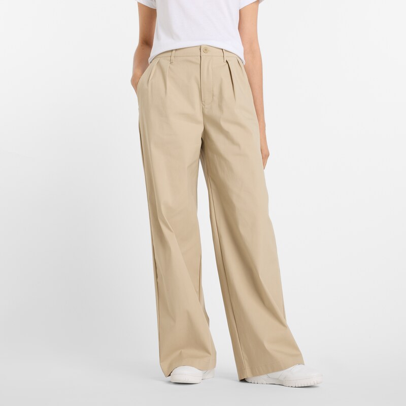 Dámské kalhoty New Balance WP51538SOT – béžové 108254423