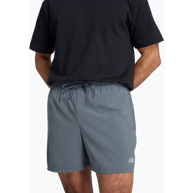 Pánské běžecké šortky New Balance Sport Essential 5 graphite