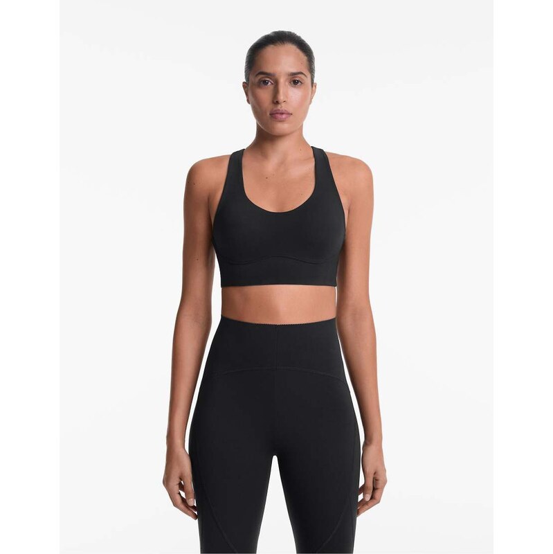 OYSHO Medium-support compressive bra with cups in black 107336763