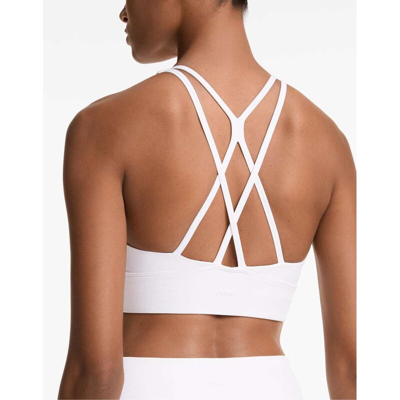 OYSHO Medium-support comfortlux sports bra with cups in off-white 115691631