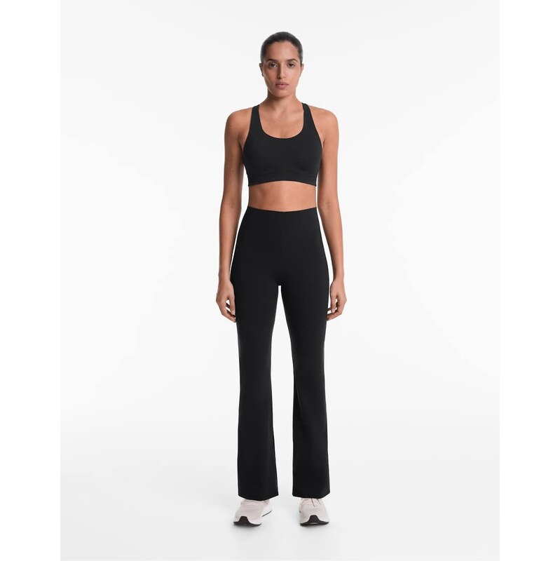 OYSHO Raise up compressive 80cm flare trousers in black 109635509