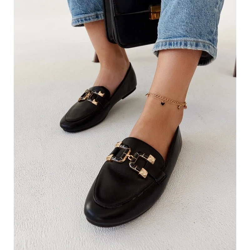 Gemre Black moccasins with a Comerio buckle