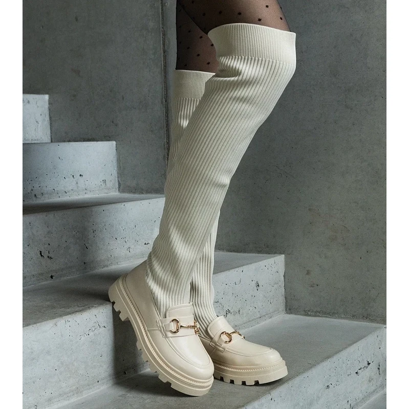 Gemre Light beige boots with a stretchy shaft on a flat heel