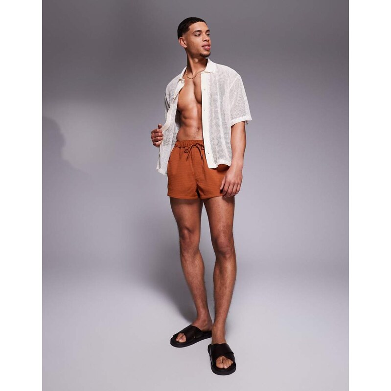 ASOS DESIGN swim shorts in super short length in orange