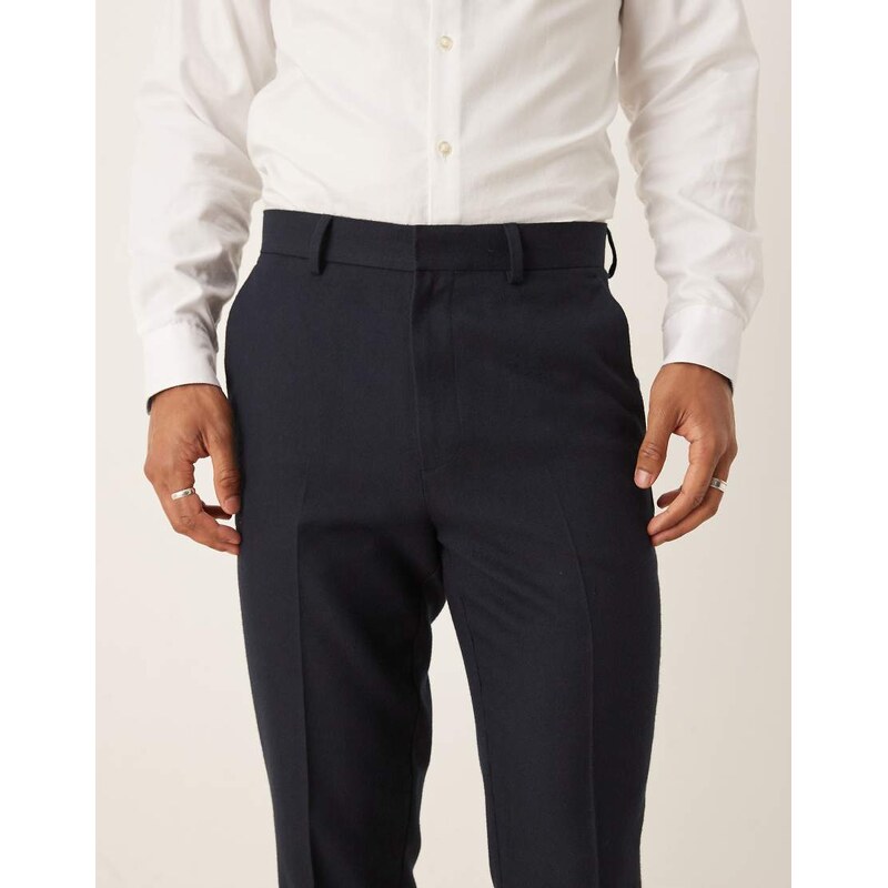ASOS DESIGN tapered suit trousers in navy herringbone wool look