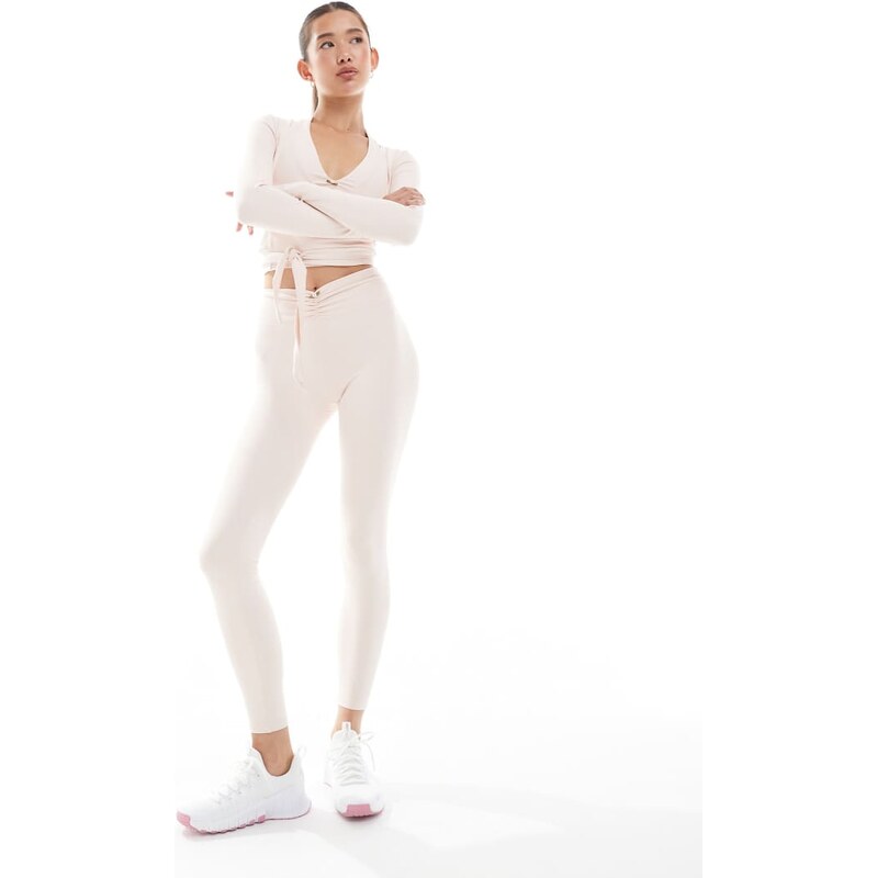 WeWoreWhat active ruched v-front leggings in pale pink 107501658