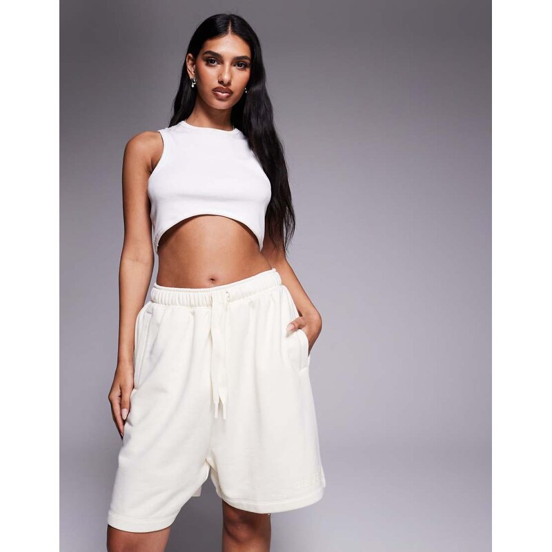 adidas Originals linear logo sweat shorts in cream-White