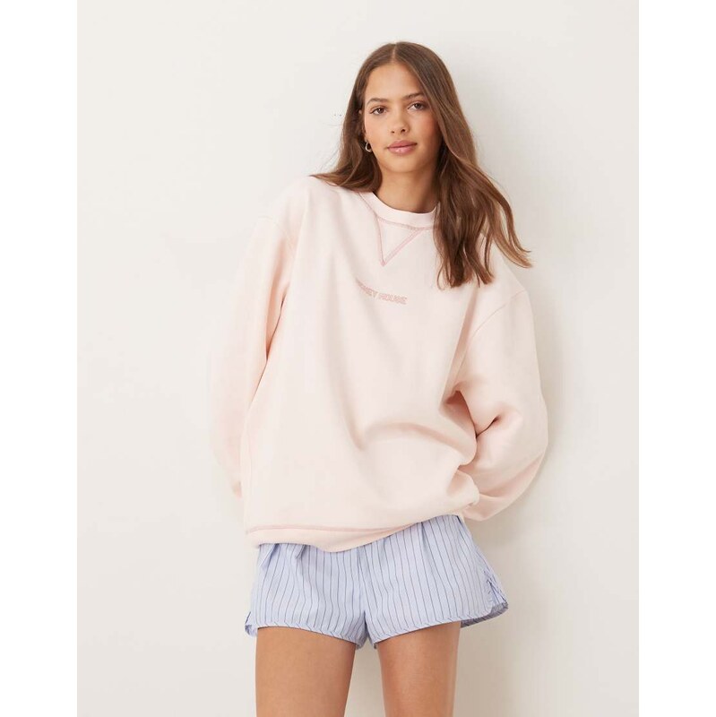 ASOS DESIGN Disney relaxed sweatshirt with Mickey Mouse print in baby 109646304