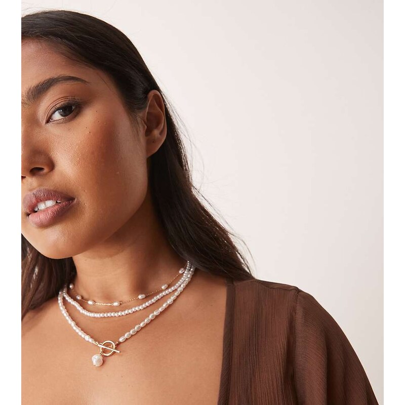 ASOS Curve ASOS DESIGN Curve multi-row necklace with faux pearls and t 107624545