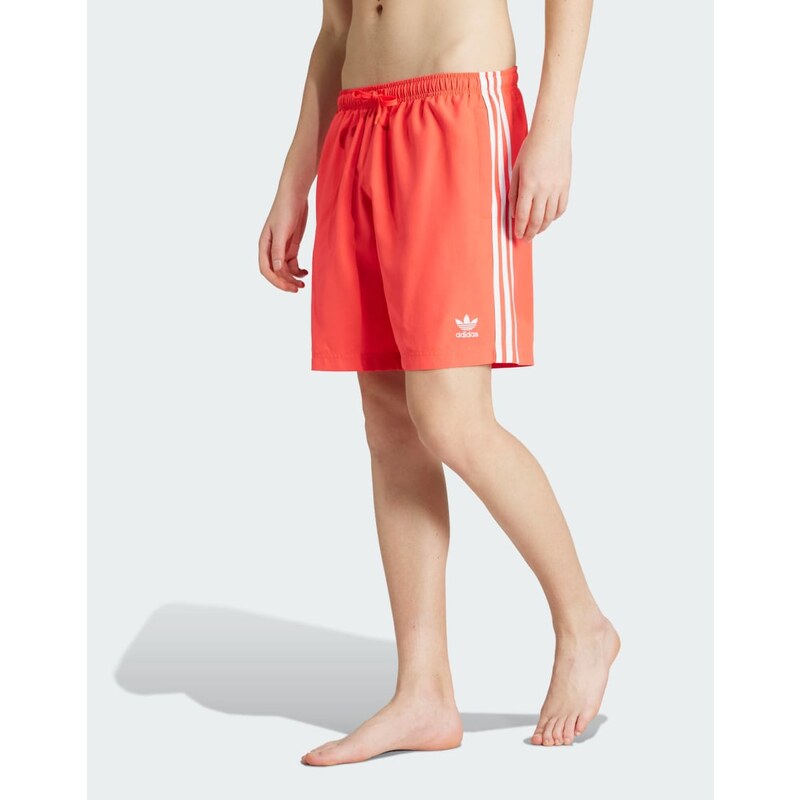 adidas Originals Adicolor 3-stripes 8-inch swim shorts in lucid red 115498876
