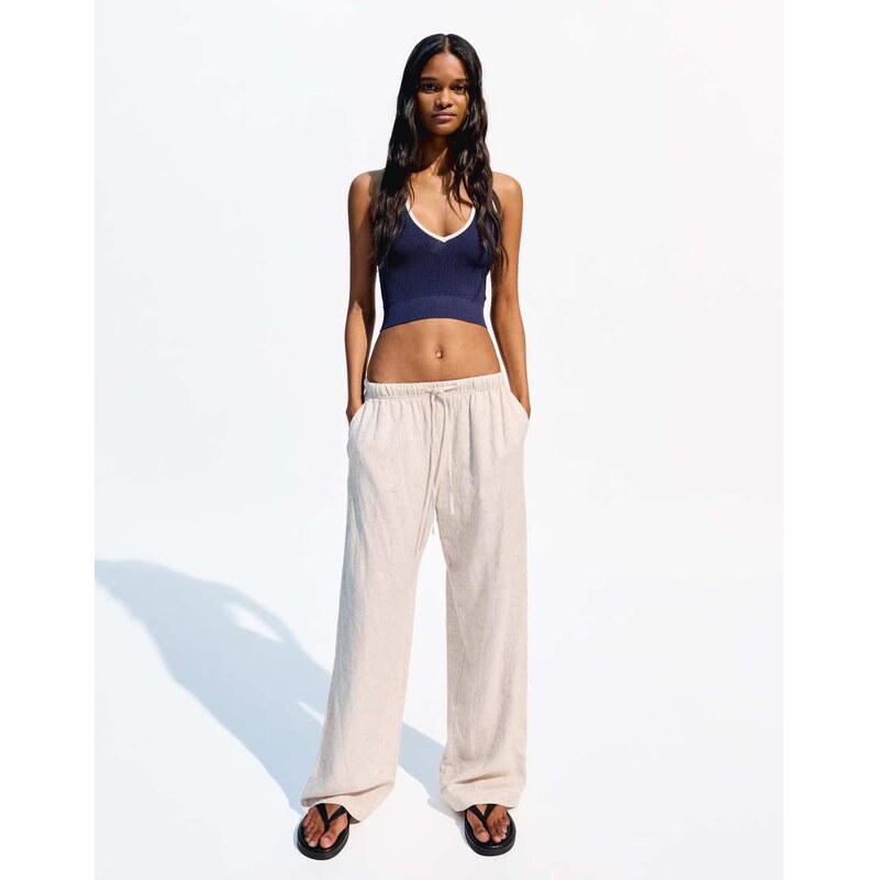 Bershka linen rich trousers with an elasticated waistband in white 107632534