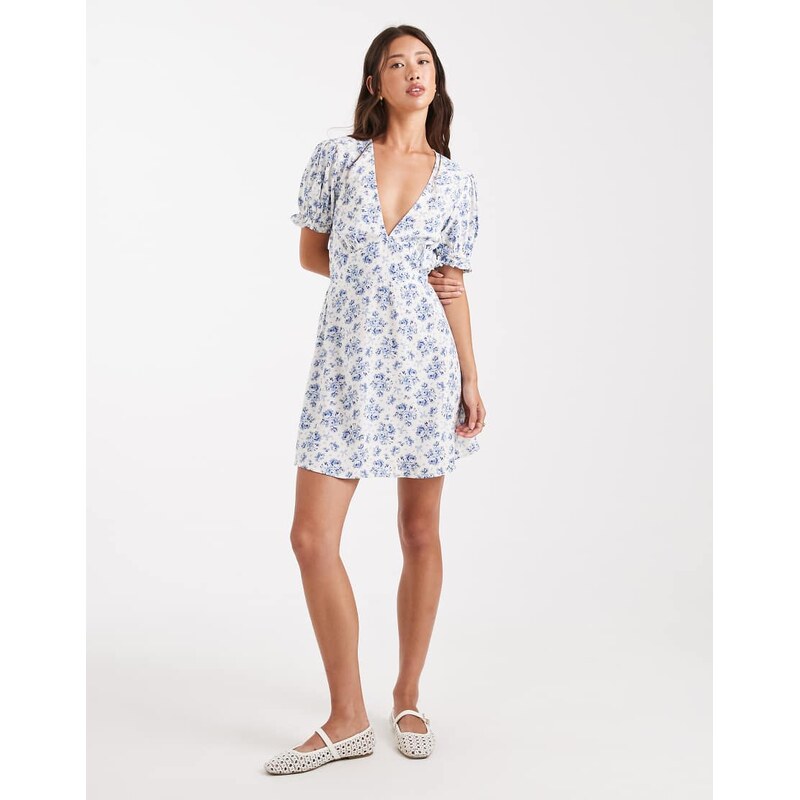 Miss Selfridge mini tea dress in spun in blue bow floral print