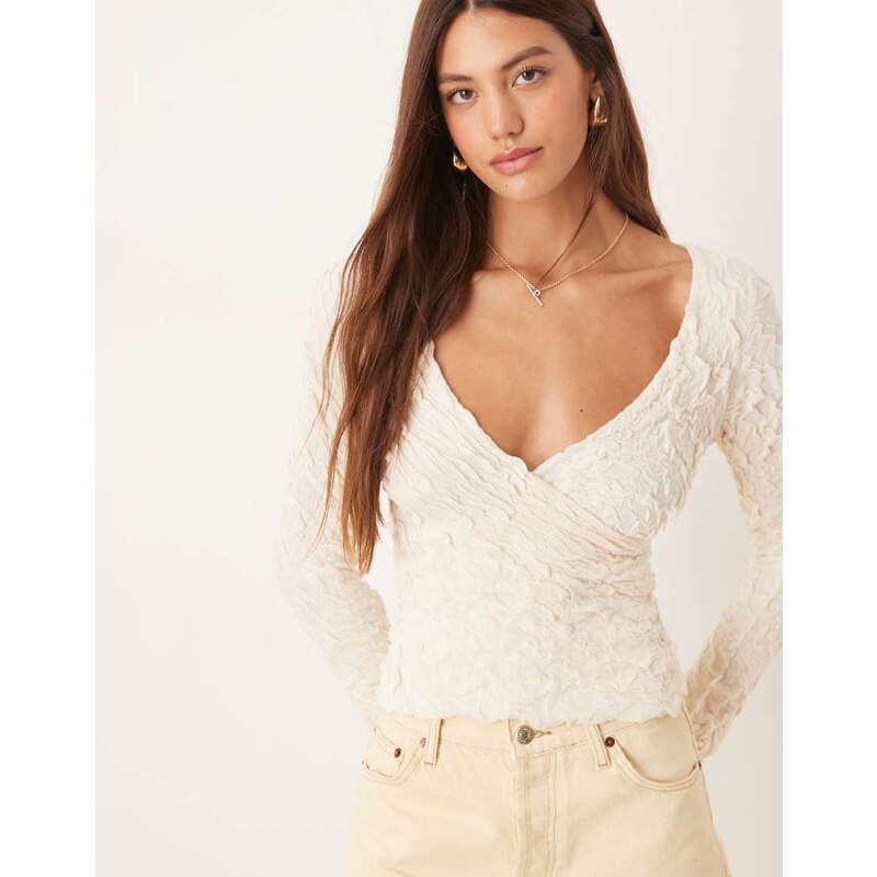 AWARE stretchy jaquard knit bell sleeve wrap detail top in cream-White 112191723