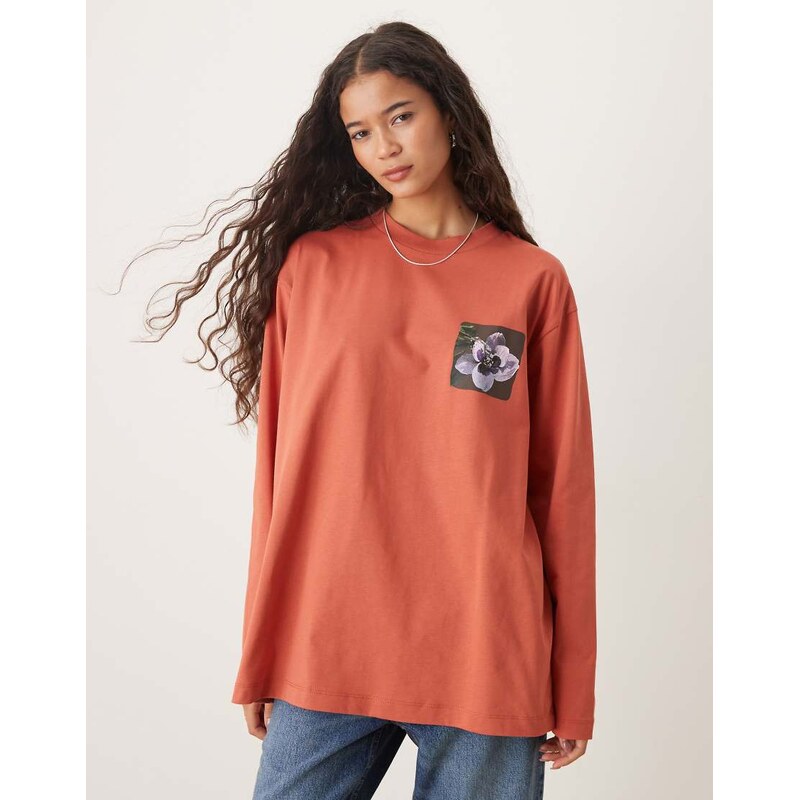 ASOS DESIGN oversized long sleeve top with floral back graphic