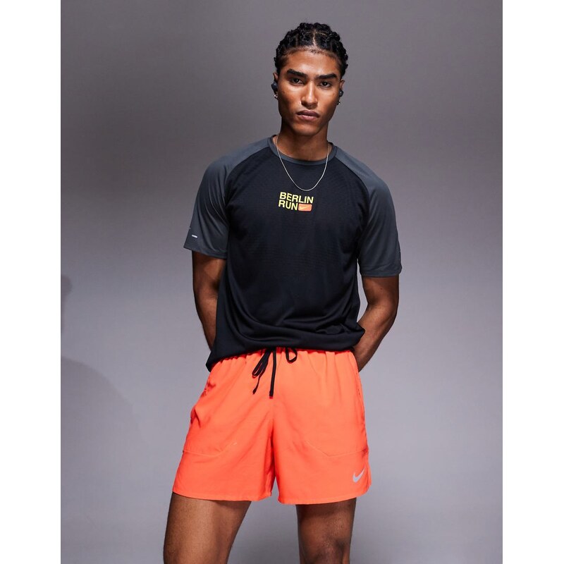 Nike Running Dri-FIT Stride 5 inch shorts in red