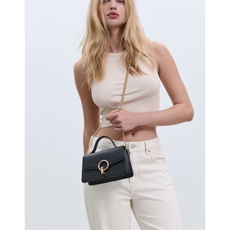 Stradivarius Crossbody bag with a round clasp in black 107721890