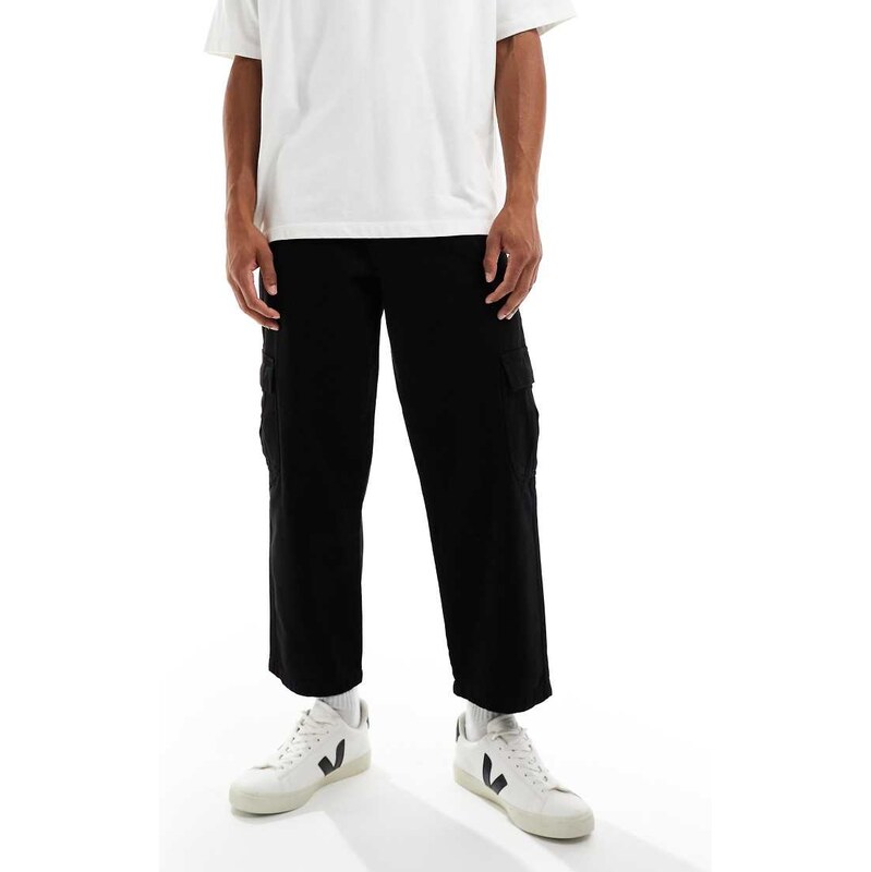 ASOS DESIGN relaxed tapered cargo trousers in black with pleats