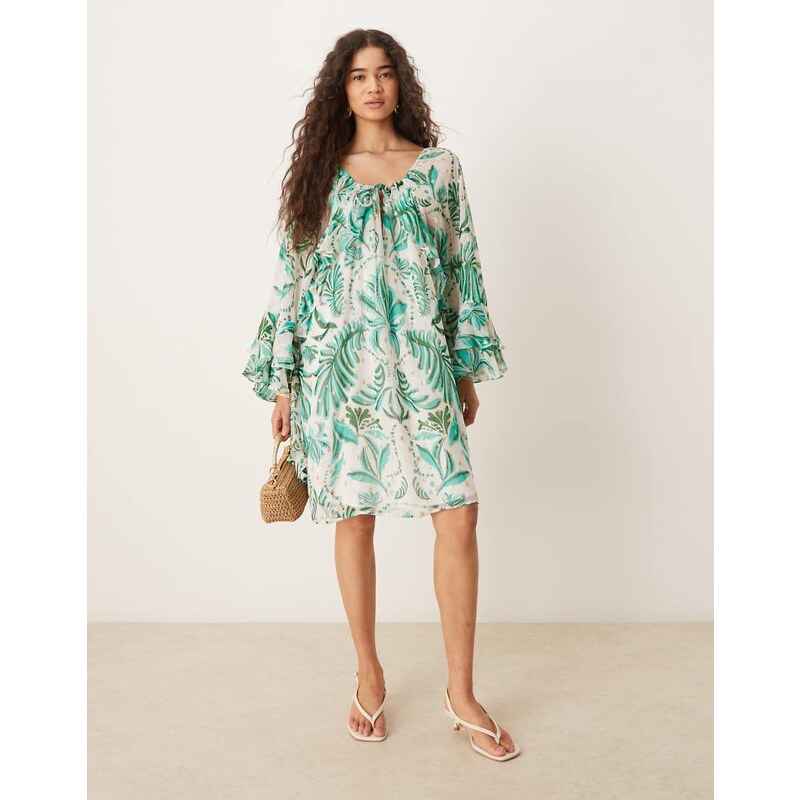 Hope & Ivy tie neck frill sleeve mini dress in green palm print