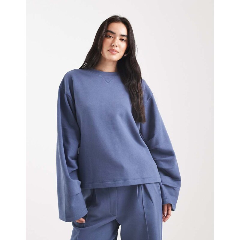 ASOS DESIGN oversized brushback sweat with ruched sleeve detail in denim blue-Navy