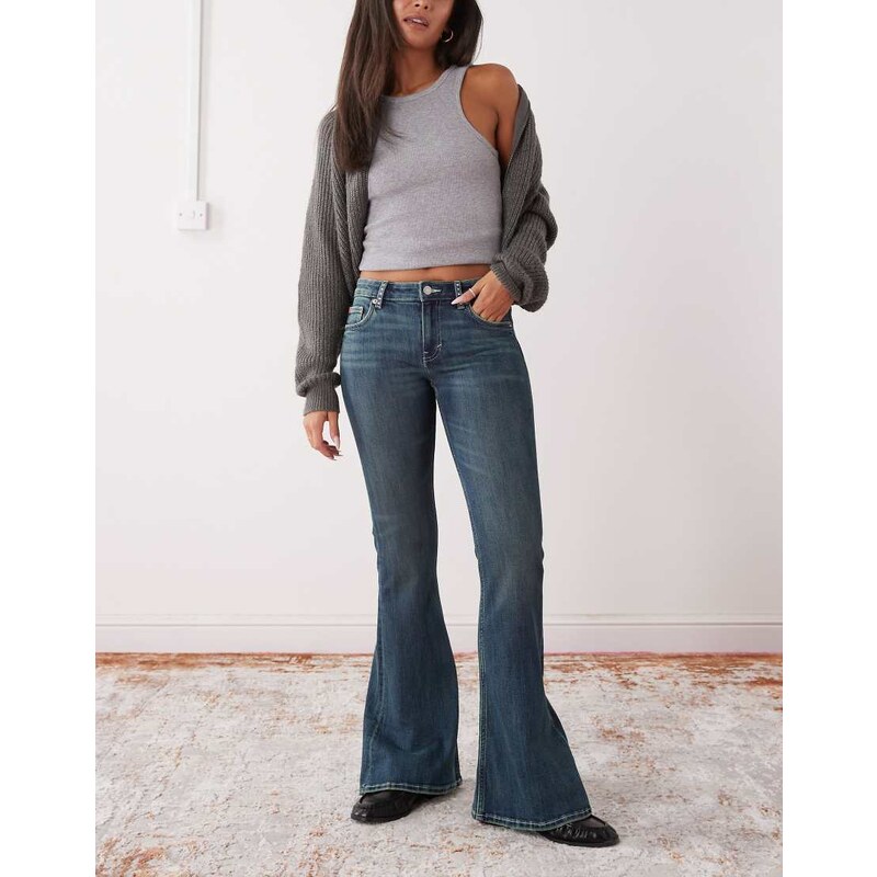 Monki Katsumi low waist flare jeans with bow embellishment-Blue 113561541