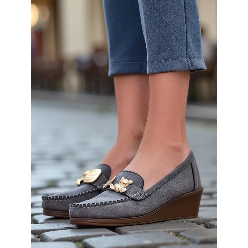 Resti Womens moccasins on a low wedge Mollan