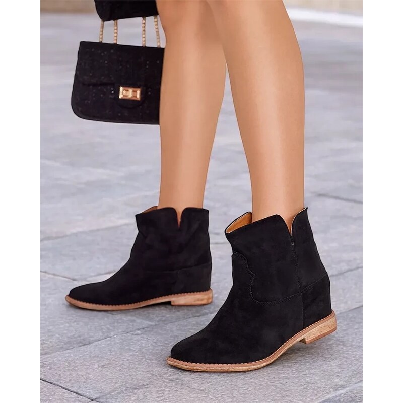 Resti Cowboy-style boots on a covered wedge Blueston