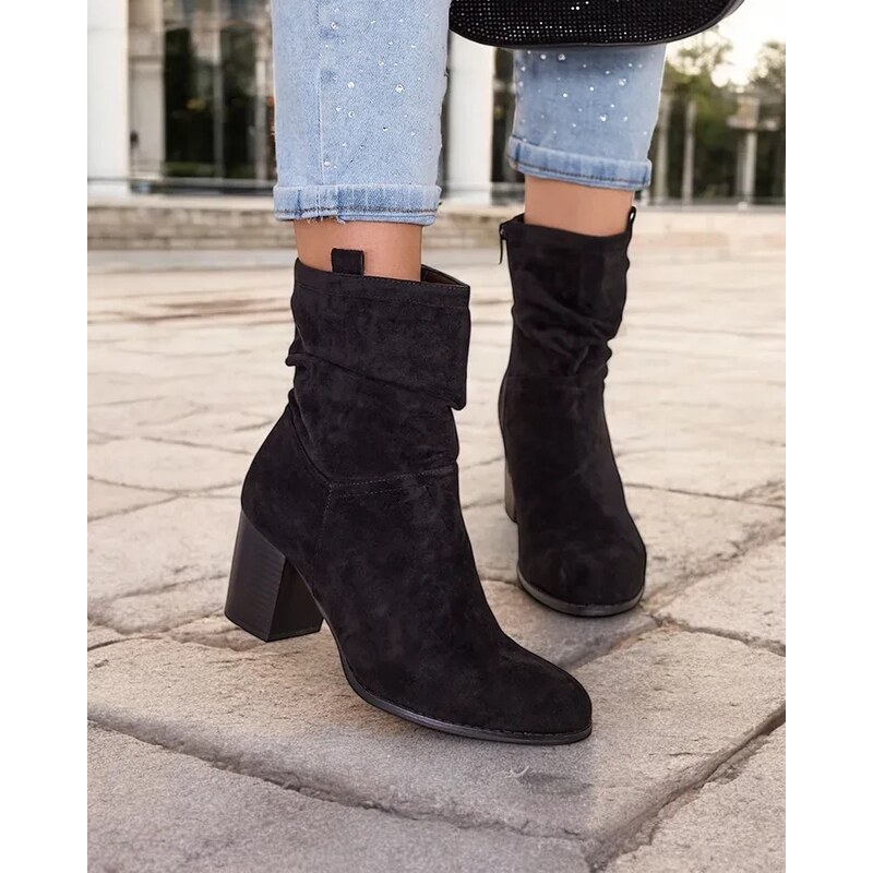 Resti Womens boots on a post Omiese