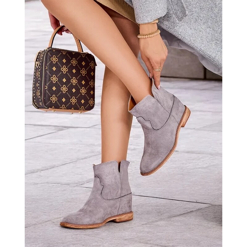 Resti Kowboy-style ankle boots on a covered wedge Bluestone