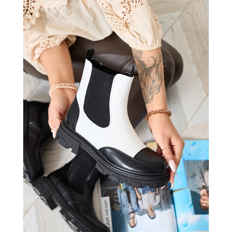 Resti White womens Userrus boots