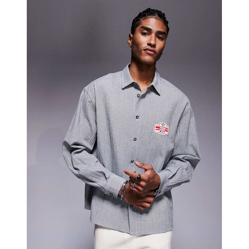 ASOS DESIGN boxy oversized shirt in navy check with chest badge