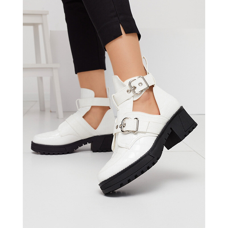 Resti White lacquered womens boots with cutout and embossing