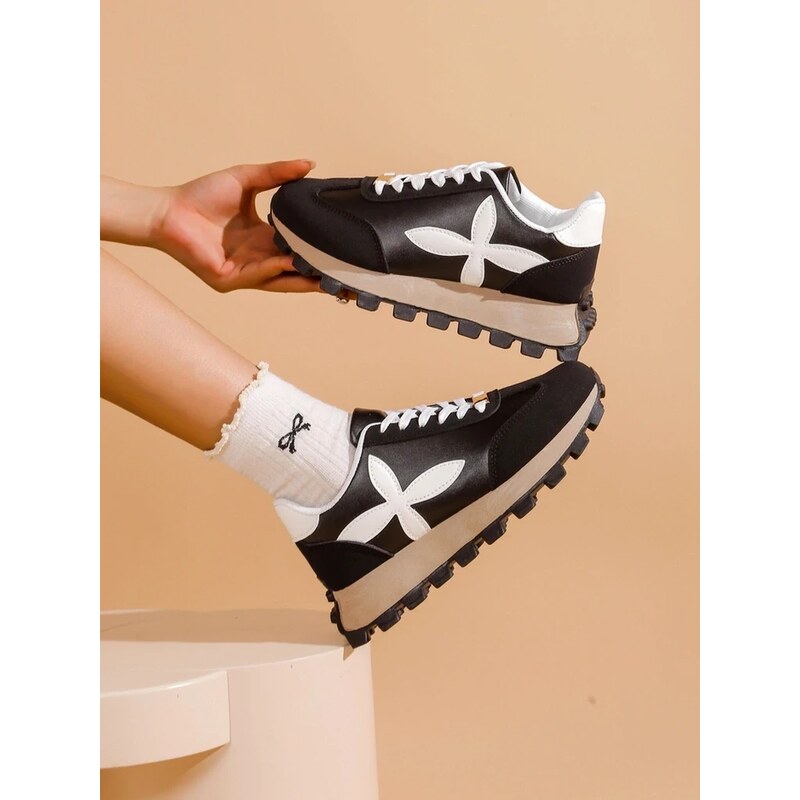 Resti Womens sports sneakers on a thicker sole Aloqa