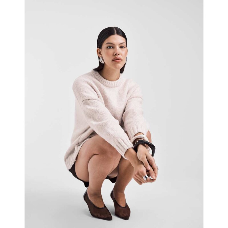 ASOS DESIGN oversized crew neck jumper with curved hem in cream