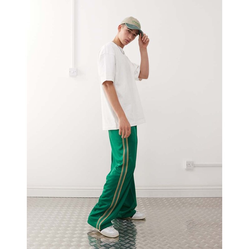 Weekday wide leg joggers with side tape detail in green