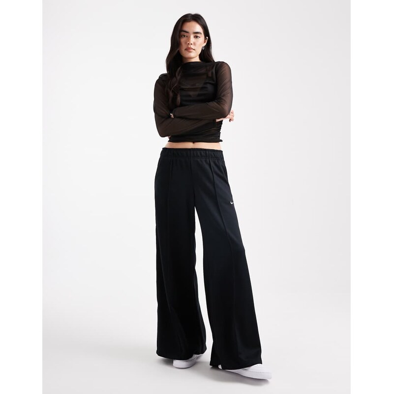 Nike wide leg track pant in black 108551454