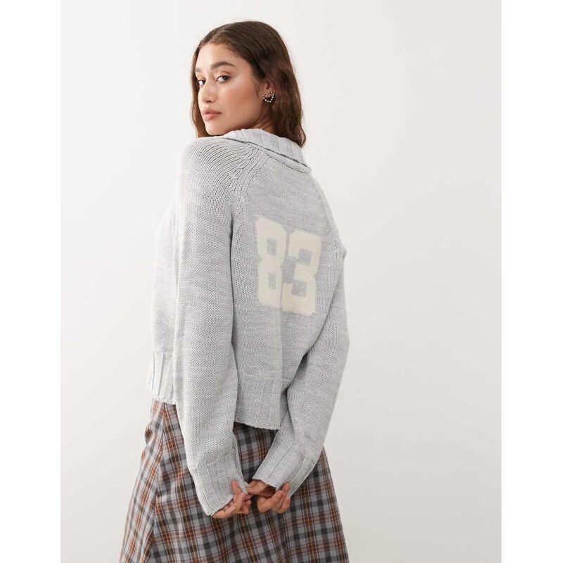 COLLUSION knitted raglan zip through with varsity number detail in 108092880