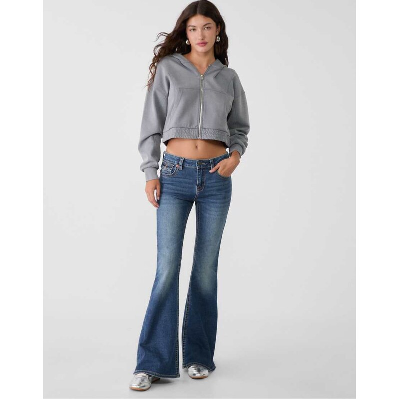 Stradivarius D04 low rise flared jeans in medium denim wash-Blue 108114995