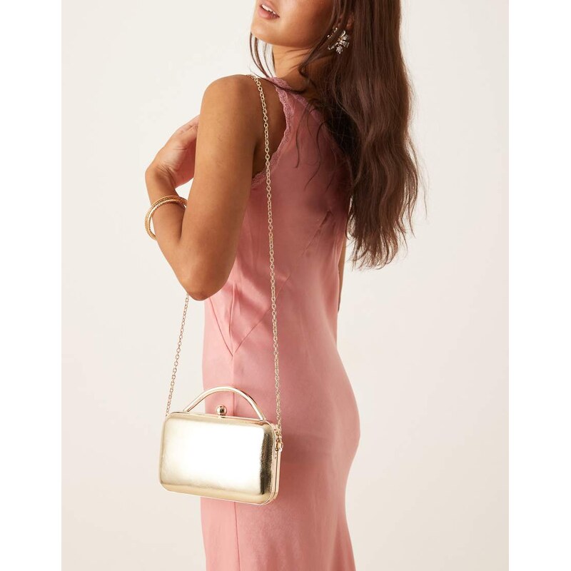 ASOS DESIGN coated round frame clutch bag in gold 108177819